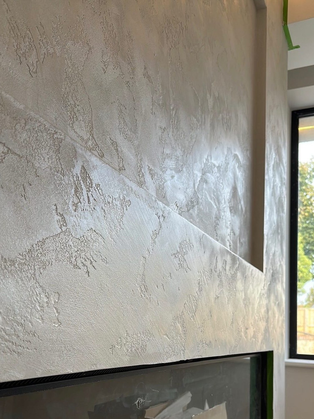 Chimney breast worked by hand